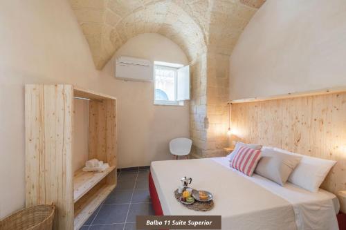 Postel nebo postele na pokoji v ubytování Balbo Suite & Apartment - Lecce Selection