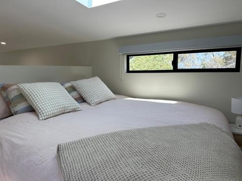 Ένα ή περισσότερα κρεβάτια σε δωμάτιο στο Kaiser Ridge - eco stay