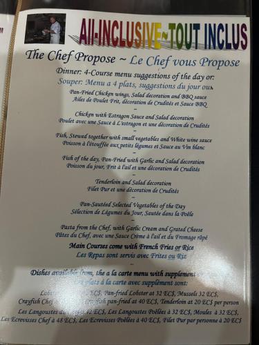 a page of a book with a list at Sunset Bay Club All Inclusive in Colihaut