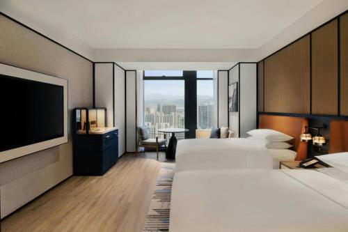 Sheraton Lanzhou Anningにあるベッド