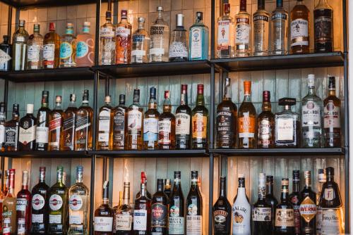 a display of different types of bottles of alcohol at Waterfront in Sliema