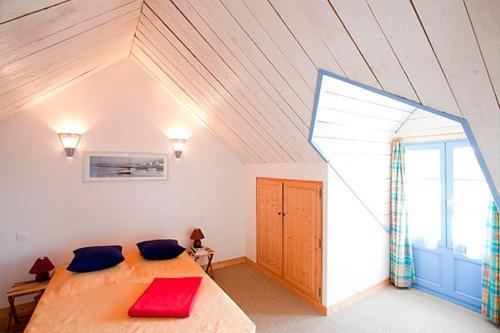 Ένα ή περισσότερα κρεβάτια σε δωμάτιο στο Camping Domaine de Kermario