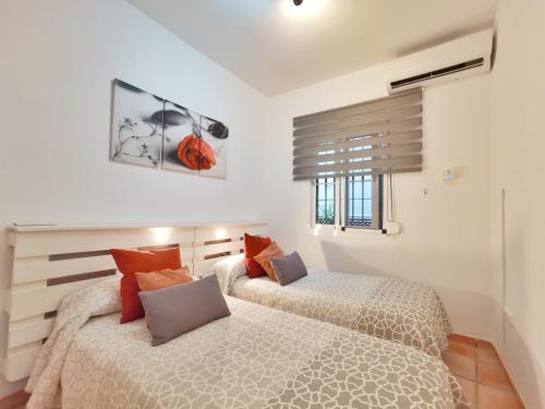 Posteľ alebo postele v izbe v ubytovaní Casa Familia Carabeo