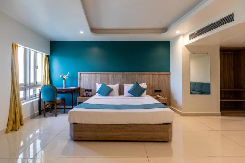 Ένα ή περισσότερα κρεβάτια σε δωμάτιο στο Hotel Amer Palace