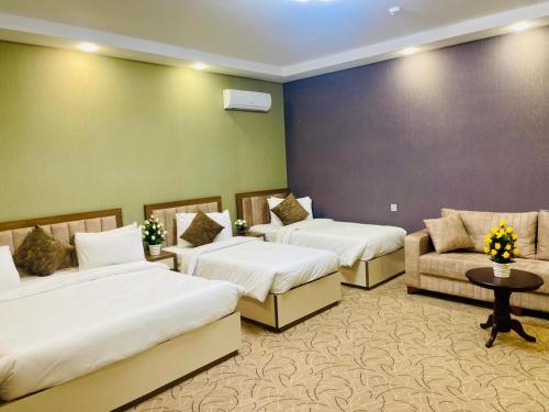 Ένα ή περισσότερα κρεβάτια σε δωμάτιο στο Royal Meridien Hotel