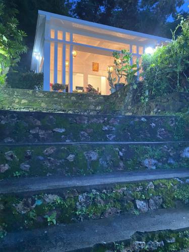 a set of stairs in front of a house at The Hill View Lombok in Kuta Lombok