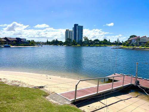 a dock in the middle of a large body of water at VILLA AQUILA - Mermaid Waters in Gold Coast