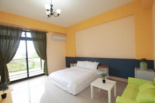 Postel nebo postele na pokoji v ubytování This Home B&B