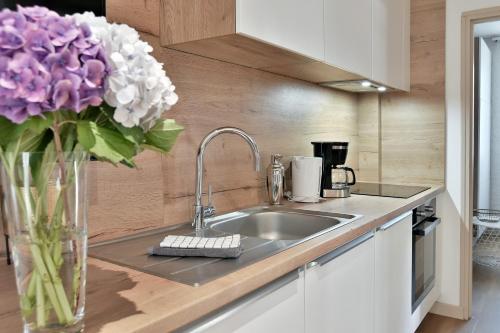 Kuchyň nebo kuchyňský kout v ubytování Gérard 2 - A 200 m de la plage