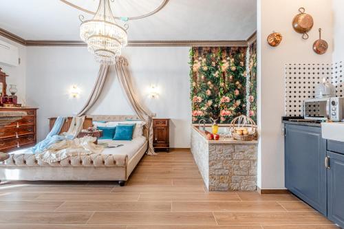 a bedroom with a bed and a christmas tree at Altalena Luxury Rooms and Spa in Siena