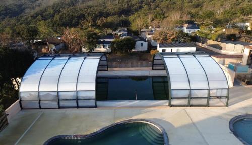 a view of the pool from the roof of a house at Camping Les Gorges de Provence in Saint-Laurent-du-Verdon