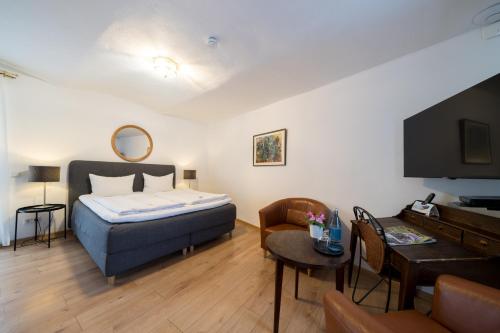 Postel nebo postele na pokoji v ubytování Hotel Restaurant Annahof