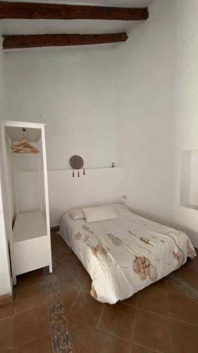 Letto o letti in una camera di Magnolia Loft A spacious, authentic space with rustic charm