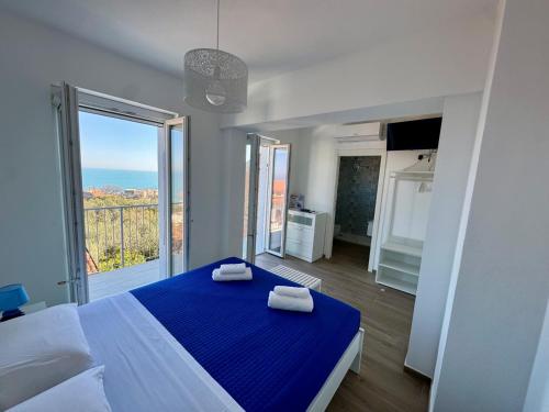 Ένα ή περισσότερα κρεβάτια σε δωμάτιο στο Borgo ninni - CASA DEBBY