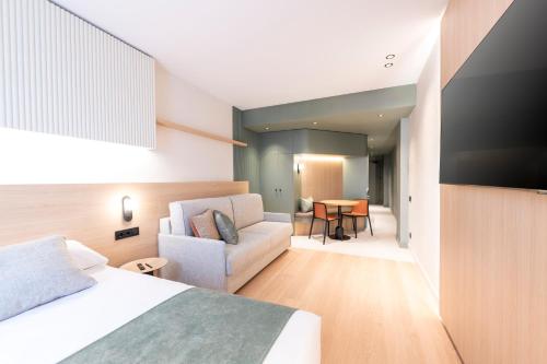 Posteľ alebo postele v izbe v ubytovaní Aparthotel Atenea Calabria