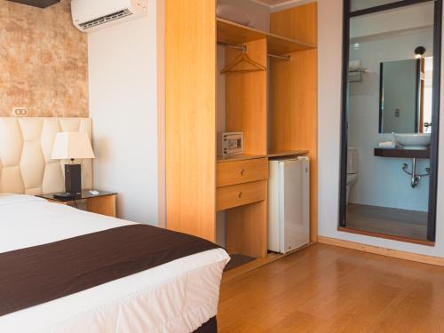 Cama o camas de una habitación en Hotel Ferré Miraflores
