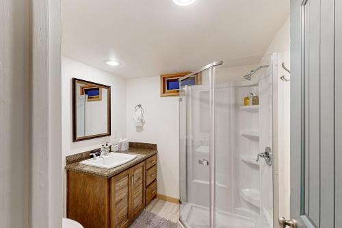 a bathroom with a sink and a shower at Telluride Lodge 324 in Telluride