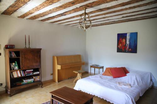 Кровать или кровати в номере L'ARAMU - Casa Antonietta - Aramola di Macra