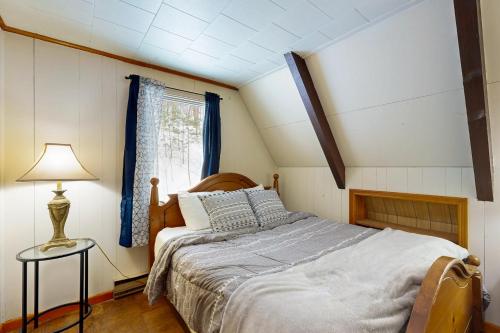 Una cama o camas en una habitación de A-Frame Escape