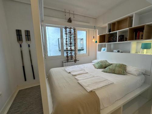 Postel nebo postele na pokoji v ubytování Txobe Apartment