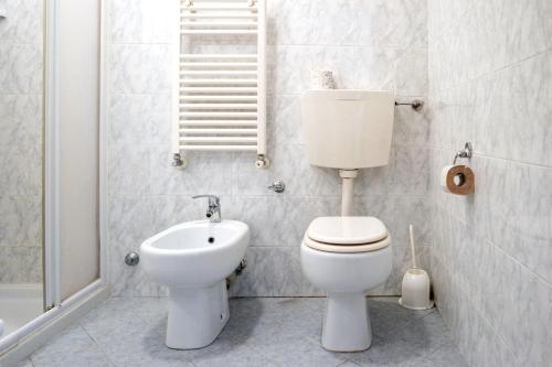 a bathroom with a toilet and a sink at B&B New Aurora Venice in Marghera