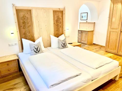 Postel nebo postele na pokoji v ubytování Chalet Bernardi Apartments