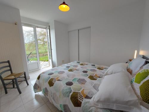 Postel nebo postele na pokoji v ubytování Le gîte du Cormier