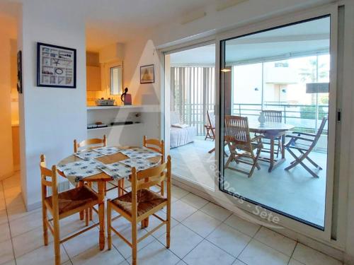 Proche des plages, residence avec piscine, T2 equipe wifi avec garage