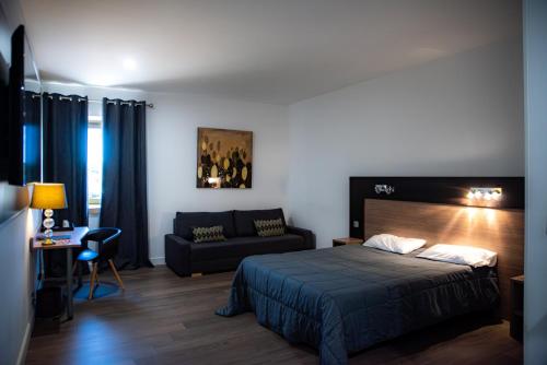 Postel nebo postele na pokoji v ubytování Aeroport Hotel - Parc Expo