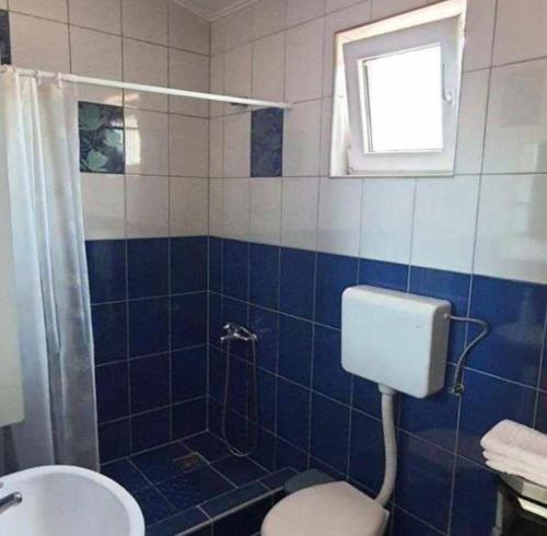 Et badeværelse på Apartments Masa