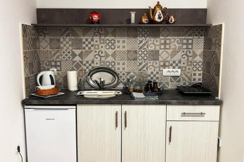 Dapur atau dapur kecil di LUX Apartmani