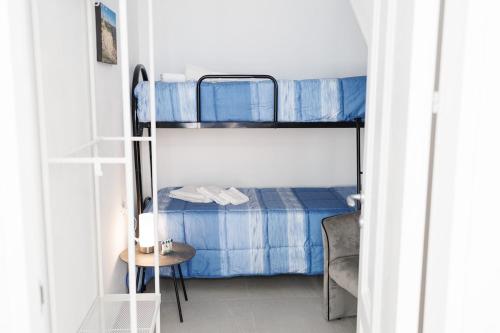 Ένα ή περισσότερα κρεβάτια σε δωμάτιο στο Domus Laureti