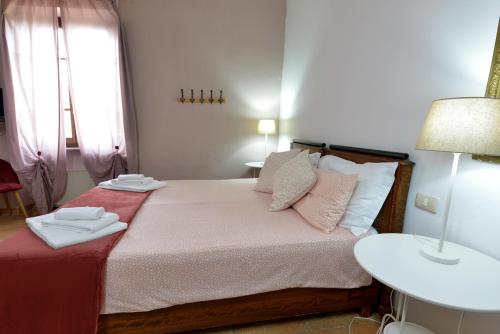 Postel nebo postele na pokoji v ubytování Borgo Faldo - Monolocale con Cucina - 119
