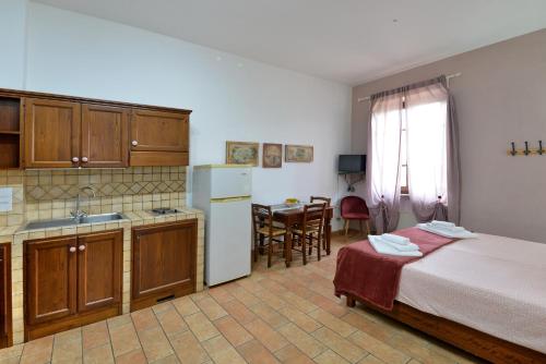 Kuchyň nebo kuchyňský kout v ubytování Borgo Faldo - Monolocale con Cucina - 119