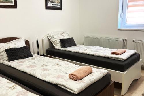 Katil atau katil-katil dalam bilik di LUX Apartmani