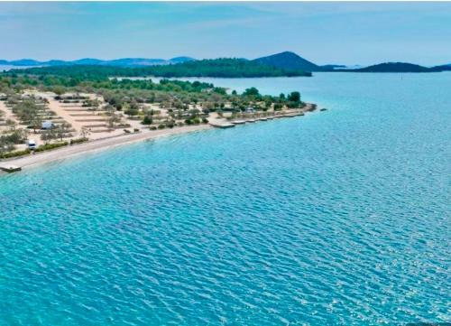 an aerial view of a beach in the water at MARIS MOBILE HOME in Drage