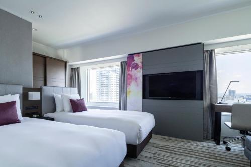 Postel nebo postele na pokoji v ubytování ANA Crowne Plaza Sapporo by IHG