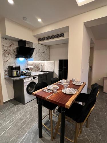 Η κουζίνα ή μικρή κουζίνα στο Adas Terra - Boutique Apartments in Ano Poli Thessaloniki