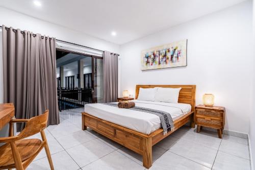 Postel nebo postele na pokoji v ubytování Balian Paradise Hotel