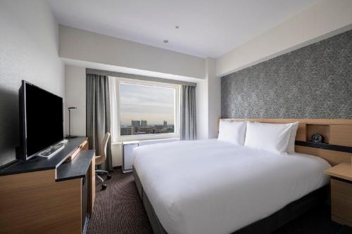 TV a/nebo společenská místnost v ubytování ANA Crowne Plaza Sapporo by IHG