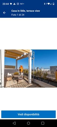 a screenshot of a website with a view of a patio at Casa in stile in Pezze di Greco