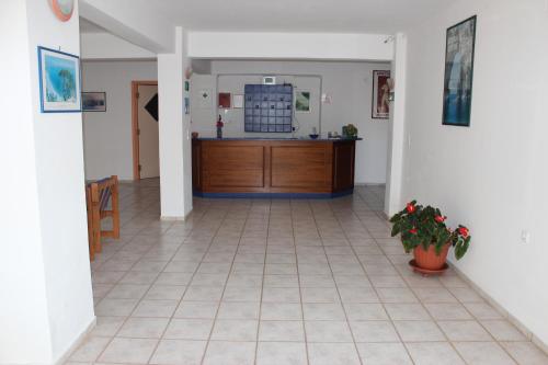 a hallway with a counter in a room at Kalliopi Studios - Apartments in Kato Daratso