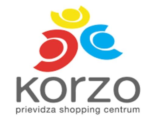 a logo for the klezmer shopping centre at Apartment house close to Bojnice in Prievidza