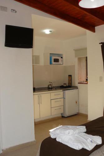 Kuchyň nebo kuchyňský kout v ubytování Amaikén Suites
