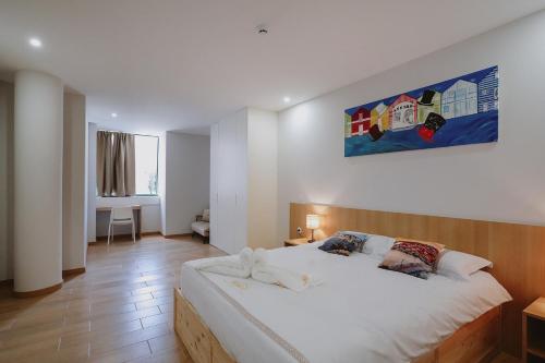 Postel nebo postele na pokoji v ubytování 888 Hostel&Suites