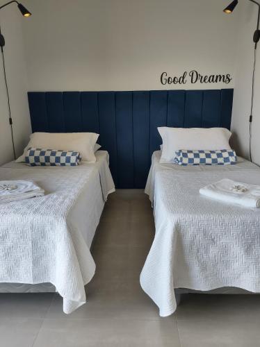 Ένα ή περισσότερα κρεβάτια σε δωμάτιο στο Apartamento em São Lourenço