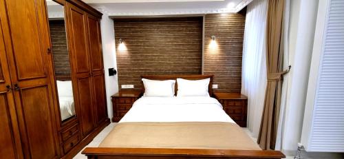 a bedroom with a large bed in a room at Taksim Flat in Istanbul