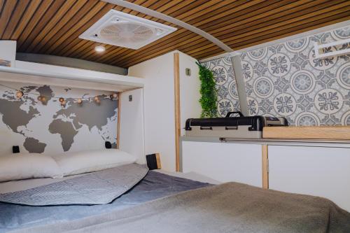 Postel nebo postele na pokoji v ubytování Camper La Guancha