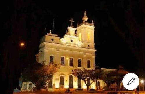 a large white building with a cross on top at Pouso 46 - Studios no Santo Antônio Além do Carmo in Salvador