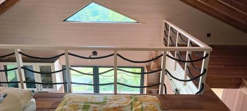 Postel nebo postele na pokoji v ubytování Tiny house Roman